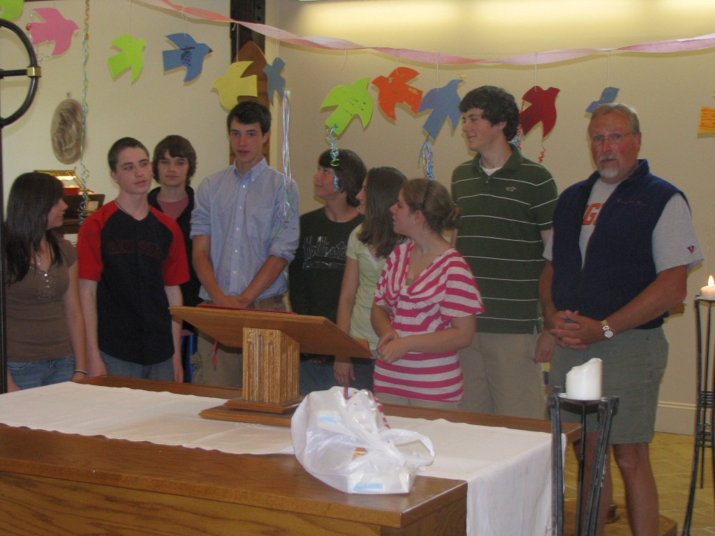 Some of the Youth Group members helped decorate the Worship Space with paper doves for the Day of Pentecost.