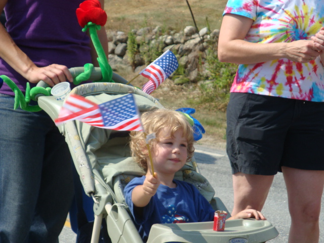 At the other end of the age spectrum, Joel also enjoyed a ride in the parade.