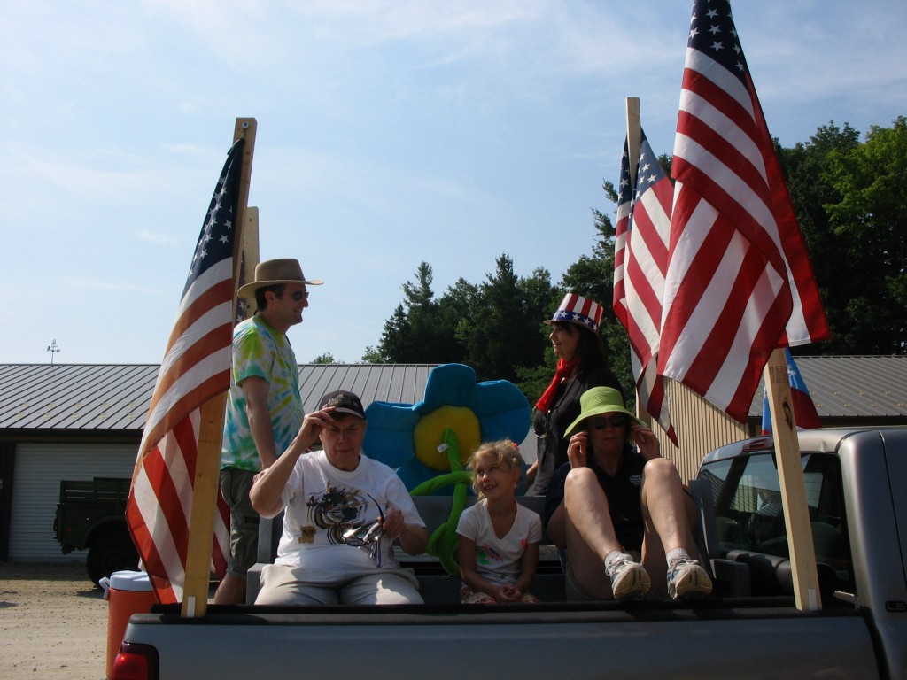 Tired marchers hitch a ride back to their cars at parade's end.